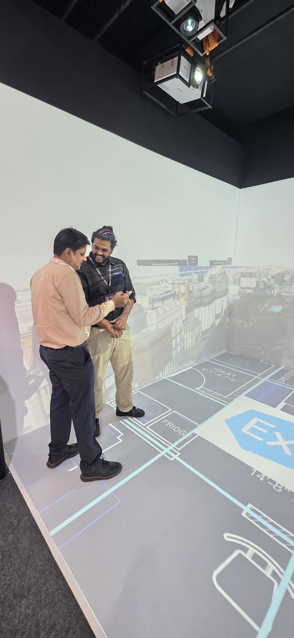 A visitor discussing the EXAPLAN demonstration.