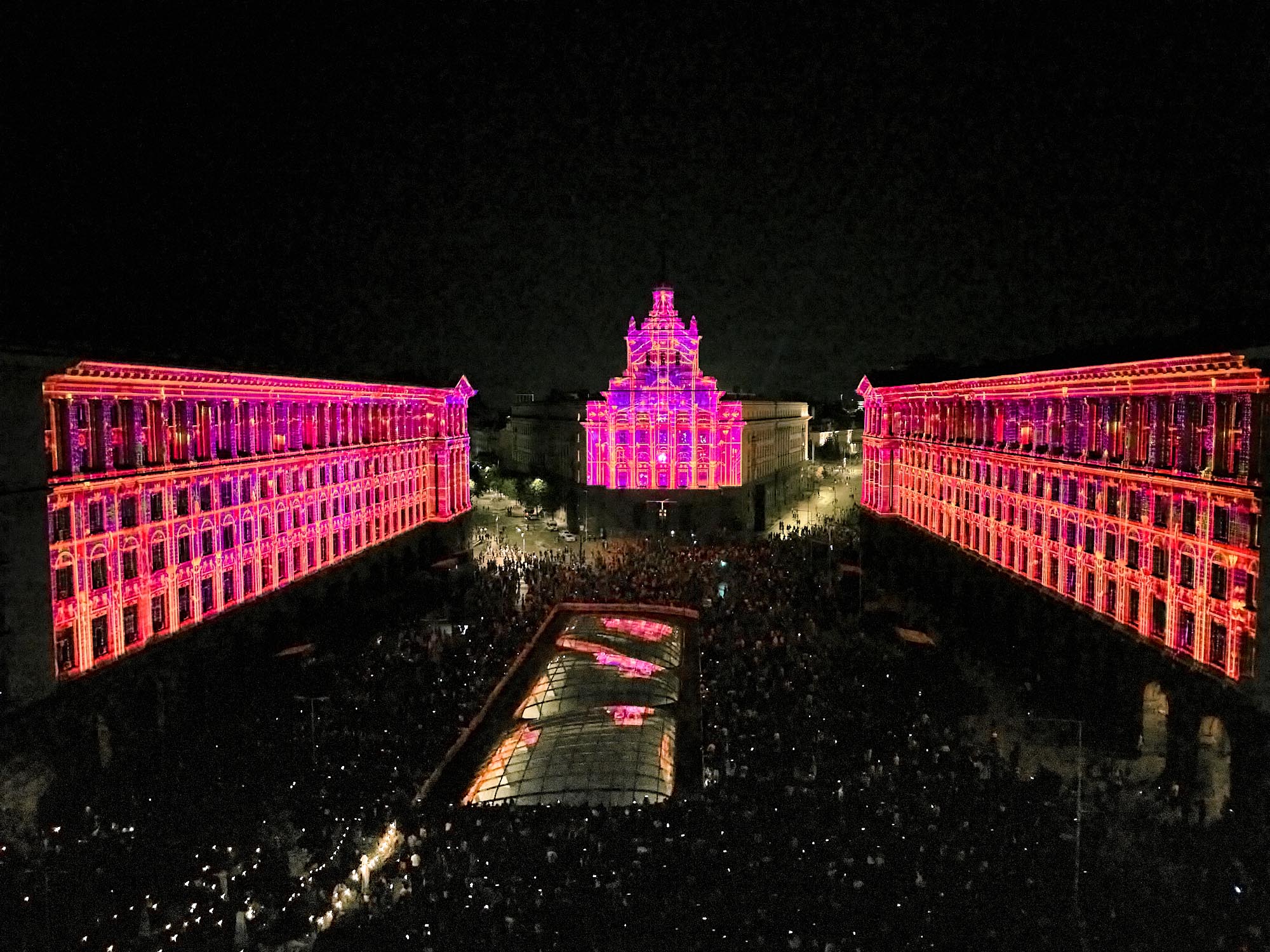 Elevated view of orange and pink architectural projections at LUNAR 2026, Sofia