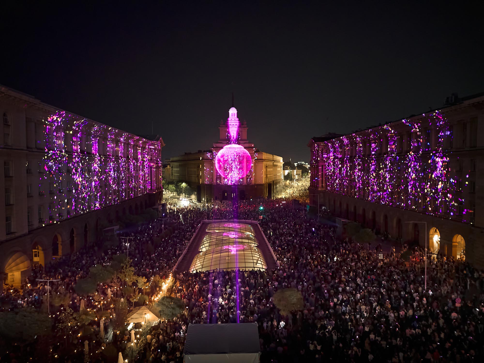 Elevated view of purple light imagery across Independence Square at LUNAR 2026, Sofia
